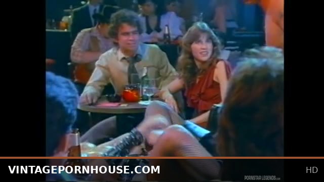 Classic pornstar Erica Boyer kicks off an orgy on stage