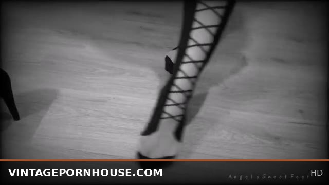 Blonde babe models new stockings and nylon high heels vintage style